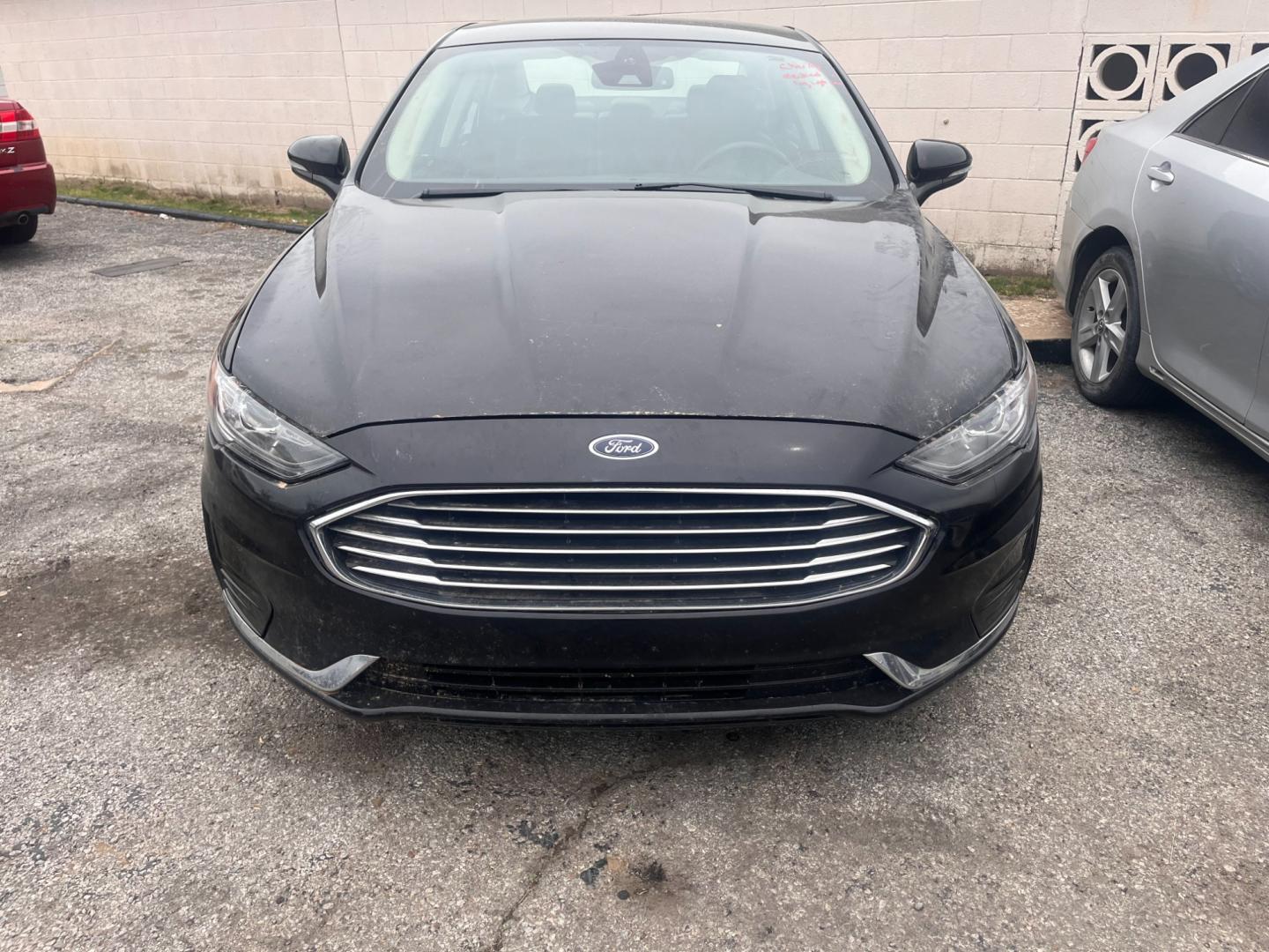 2020 BLACK Ford Fusion SEL (3FA6P0CD5LR) with an 1.5L L4 DOHC 16V engine, 6A transmission, located at 8101 E. Skelly Dr., Tulsa, OK, 74129, (918) 592-3593, 36.121891, -95.888802 - Photo#2